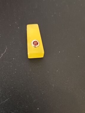 Yellow Resin Pendant with Red Gem Accent